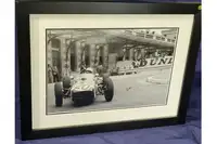 Sir Stiling Moss pictured in his Lotus 18 at Monaco in 1961.-For Sale