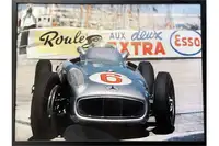 A Large Framed Image of Sir Stirling Moss at the Wheel of hi-For Sale