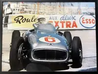 A Large Framed Image of Sir Stirling Moss at the Wheel of hi-For Sale