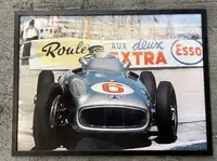 A Large Framed Image of Sir Stirling Moss at the Wheel of hi-For Sale