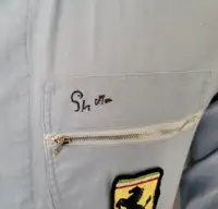 Sir Stirling Moss-Signed 'Ferrari' Race Suit and Period Helm-For Sale