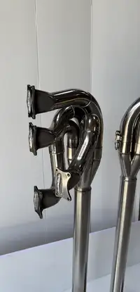 A Pair of Lamps Crafted from the Exhaust System of a Ford Co-For Sale