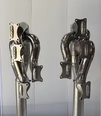 A Pair of Lamps Crafted from the Exhaust System of a Ford Co-For Sale