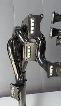 A Pair of Lamps Crafted from the Exhaust System of a Ford Co-For Sale