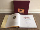 Sir Jackie Stewart signed Elf Commemorative book.-Sold