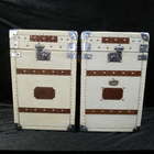 A pair of very smart, Army & Navy Travel Trunks-Auction Lot