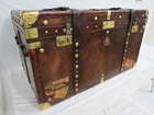 A large Army & Navy leather covered Travel Trunk -Sold