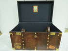 A large Army & Navy leather covered Travel Trunk -Sold