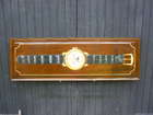 Aston Martin Le Mans themed Watch advertising board.-Auction Lot