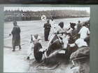 A selection of Motor Racing Paintings and Photos.-Sold