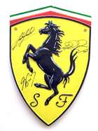 Ferrari metal shield, signed Surtees, Mansell, Prost-Sold