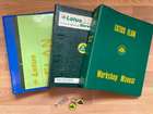 Numerous Lotus manuals and key-rings-Sold