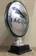 A Jaguar-Themed Cast Aluminium Trophy-Type Roundel-Sold