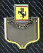 An enamelled-chrome Ferrari Owners' Club grille badge mounte-Sold