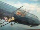 Sopwith Camel biplane attacking the WWI Zeppelin Airship L53-Sold