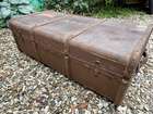 Selection of Four Well-Travelled Suitcases-Auction Lot