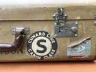 Selection of Four Well-Travelled Suitcases-Auction Lot
