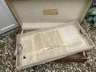 Selection of Four Well-Travelled Suitcases-Auction Lot