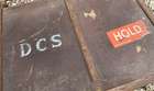 Selection of Four Well-Travelled Suitcases-Auction Lot