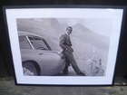A Pair of Framed Prints depicting Sean Connery as 007 in 'Go-Sold