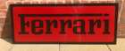 A Ferrari-themed Celluloid Garage-Type Wall Sign-Sold