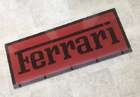 A Ferrari-themed Celluloid Garage-Type Wall Sign-Sold