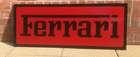 A Ferrari-themed Celluloid Garage-Type Wall Sign-Sold