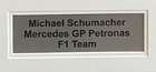 Michael Schumacher-signed Mercedes Petronas F1 Team Shirt -Sold
