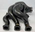 A Pair of Mercedes-AMG ONE Prototype Carbonfibre Intake Mani-Auction Lot