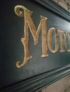 A Beautiful Hand-Carved Wooden 'Motor Spirit' Wall Sign -Sold