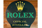 A Rare 'Rolex' Enamelled Tin-Plate Advertising Sign -Sold