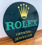 A Rare 'Rolex' Enamelled Tin-Plate Advertising Sign -Sold