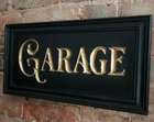 A Beautiful Hand-Carved Wooden 'Garage' Wall Sign -Sold