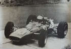 Seven Large Format Photographic Prints of Racing Ferraris Through the Years