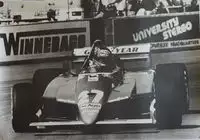 Seven Large Format Photographic Prints of Grand Prix Ferraris Through the Years