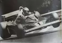 Seven Large Format Photographic Prints of Grand Prix Ferraris Through the Years