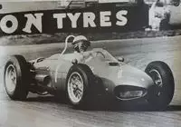 Seven Large Format Photographic Prints of Grand Prix Ferraris Through the Years