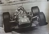 Seven Large Format Photographic Prints of Grand Prix Ferraris Through the Years