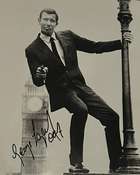 A Rare, Genuine and Hand-Signed George Lazenby 007 Autograph 