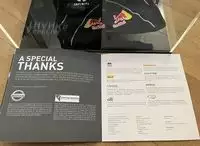 A Pair of Red Bull Gloves signed by Sebastian Vettel