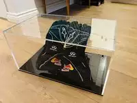 A Pair of Red Bull Gloves signed by Sebastian Vettel