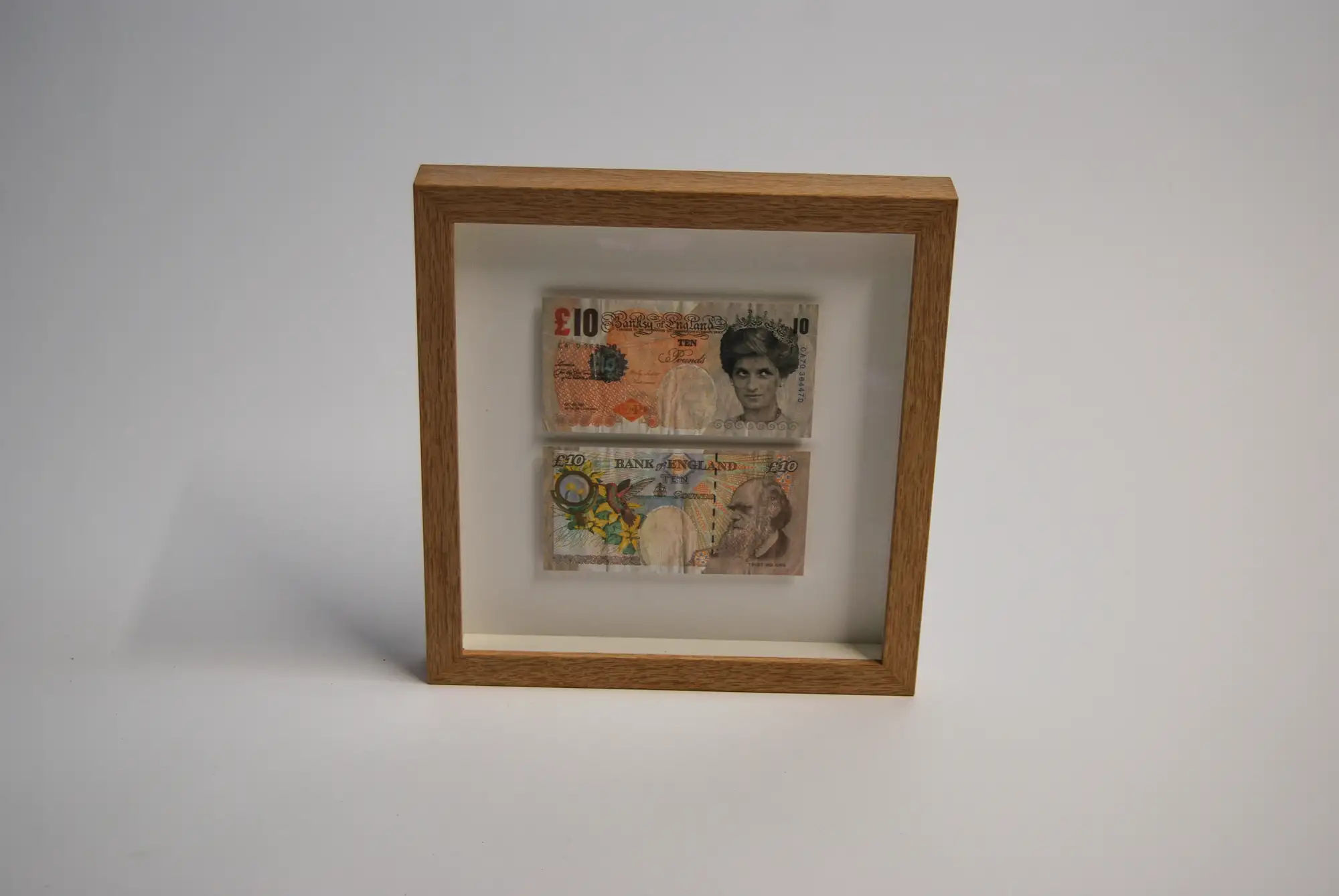 A Pair of Di-Faced Tenner Notes by Banksy