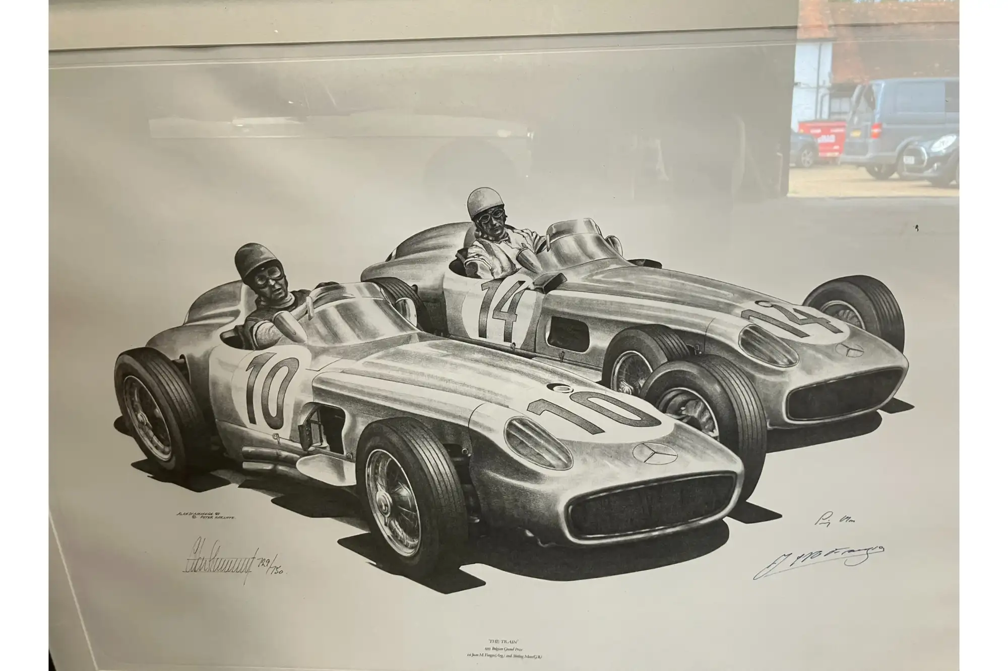 Signed Print of Juan Manuel Fangio and Sir Stirling Moss at -Sold