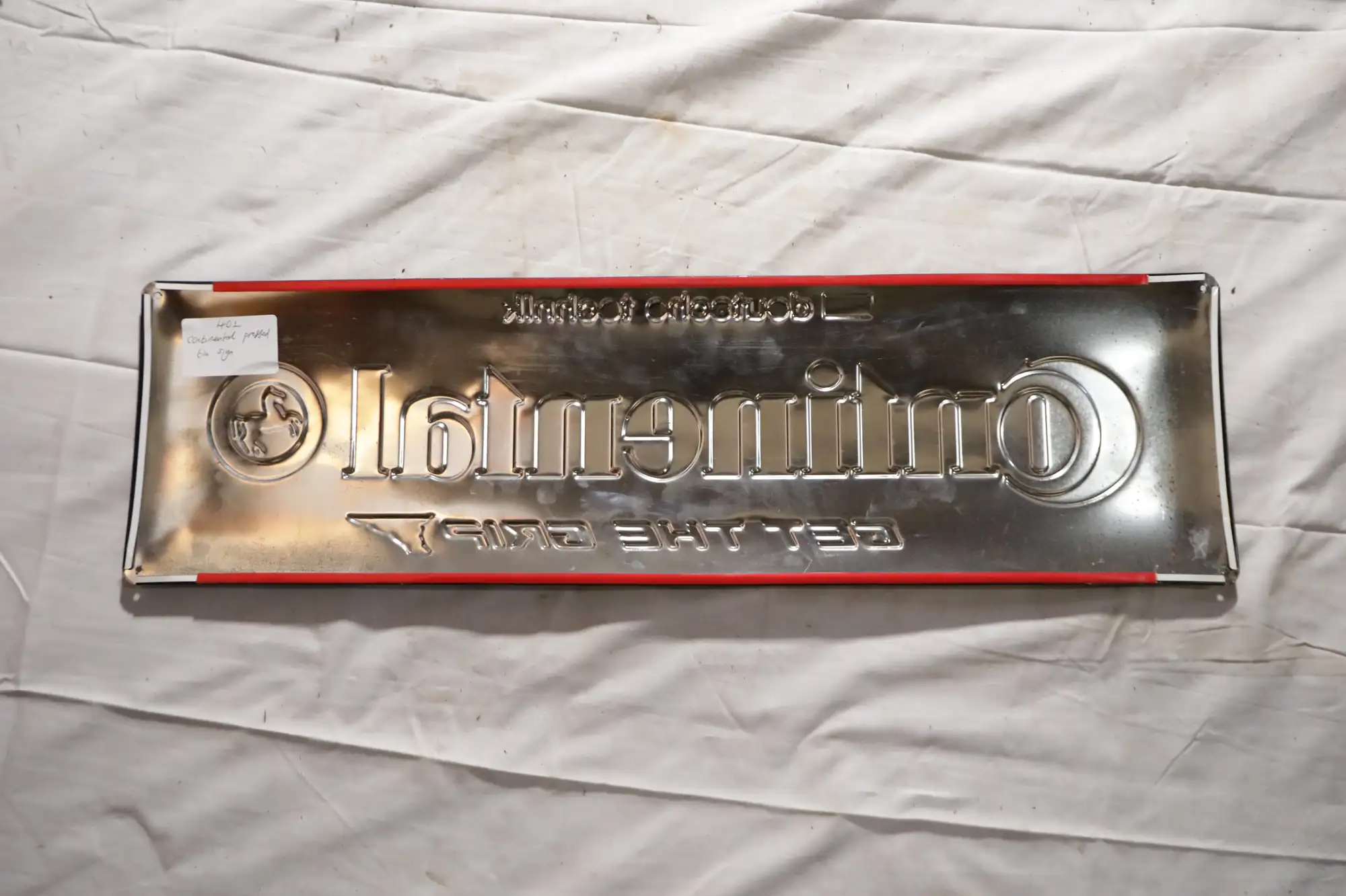 Continental Pressed Tin Sign-For Sale