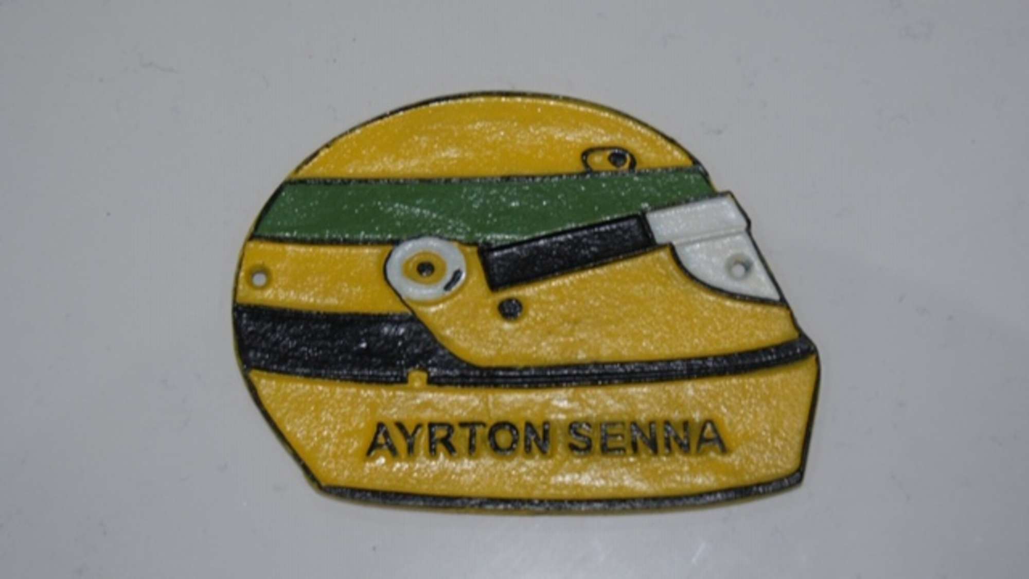 Ayrton Senna cast plaque wall-sign.-Sold
