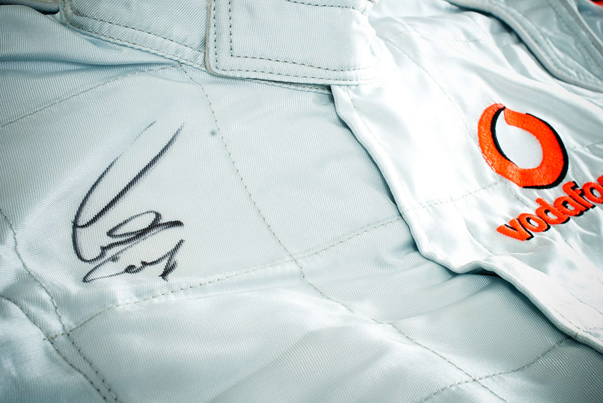 Lewis Hamilton signed and worn Vodaphone McLaren 