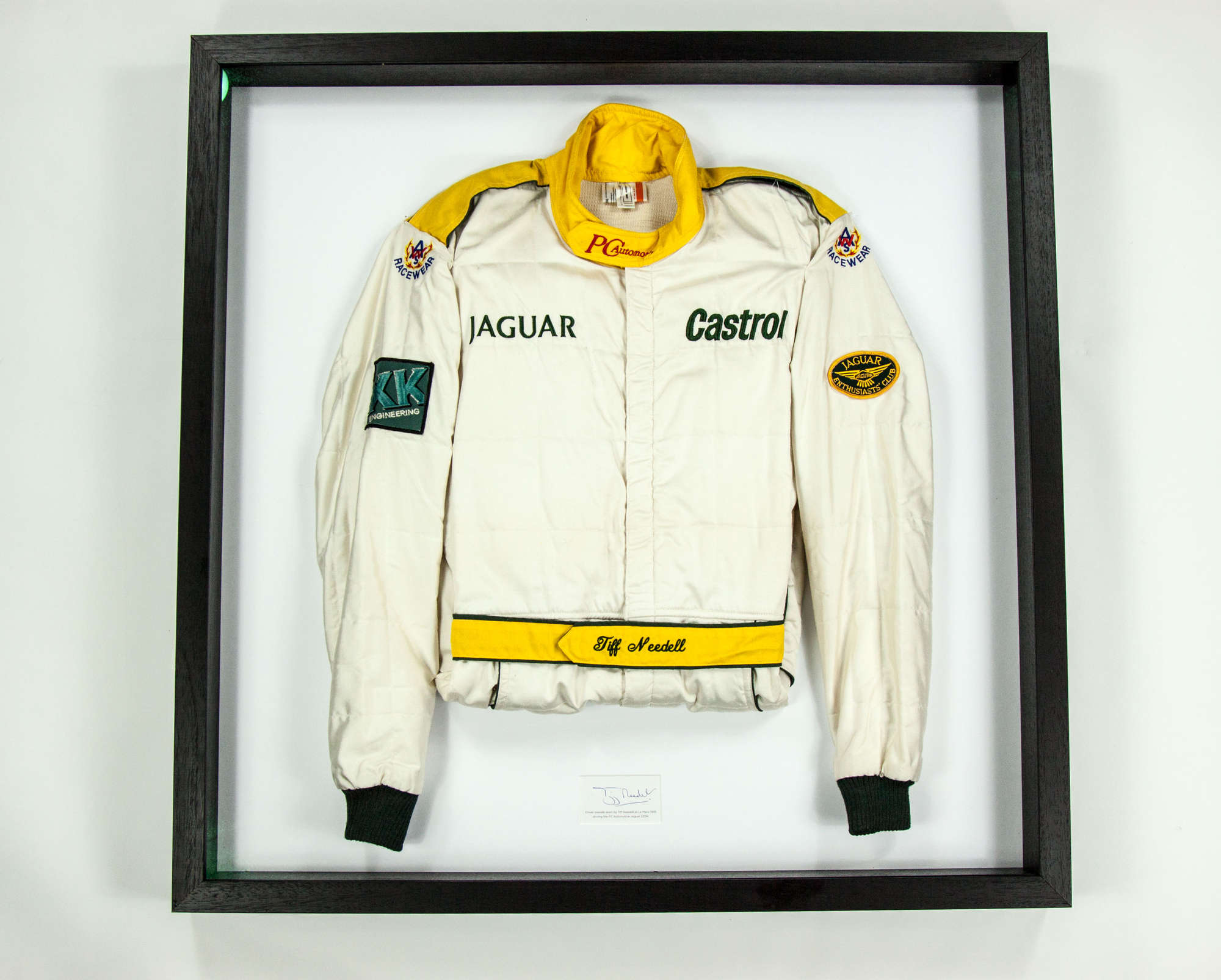 Two sets of race overalls with race related items-Sold