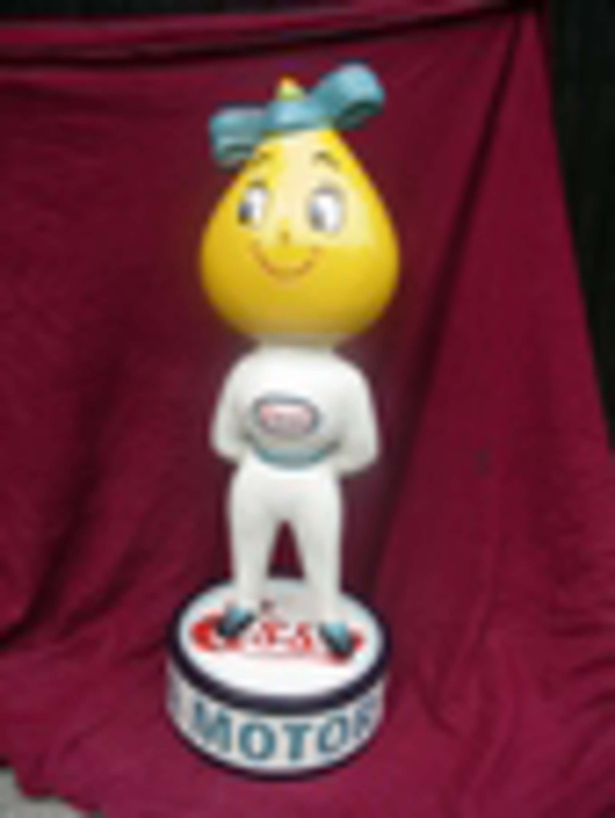 A delightful hand painted fiberglass Miss Drip 