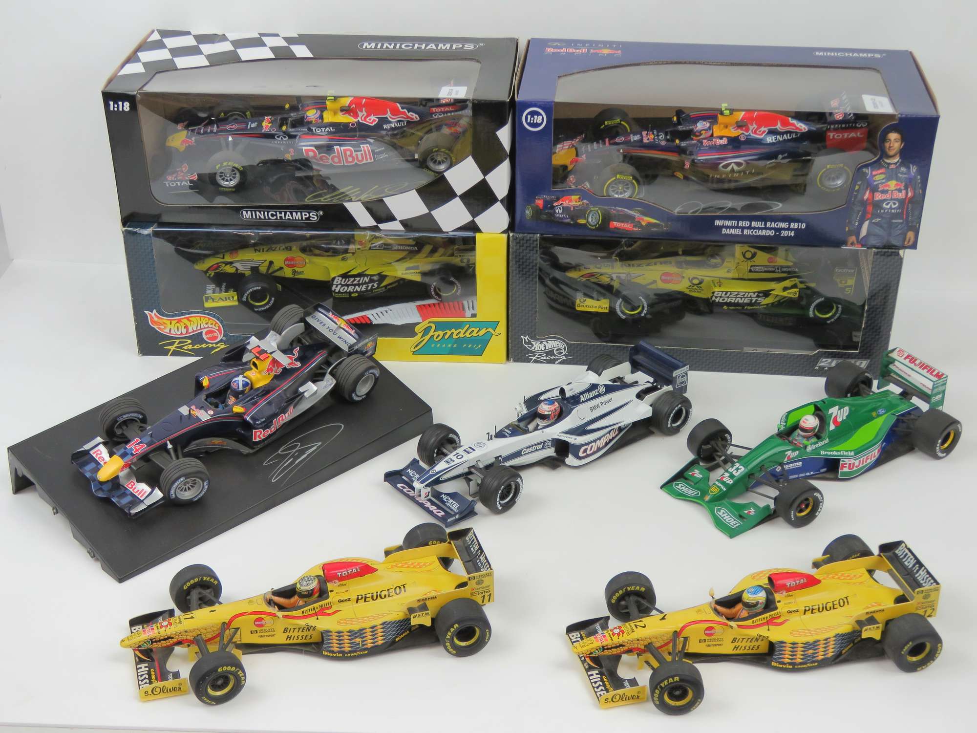Nine 1:18 scale racing cars-Sold