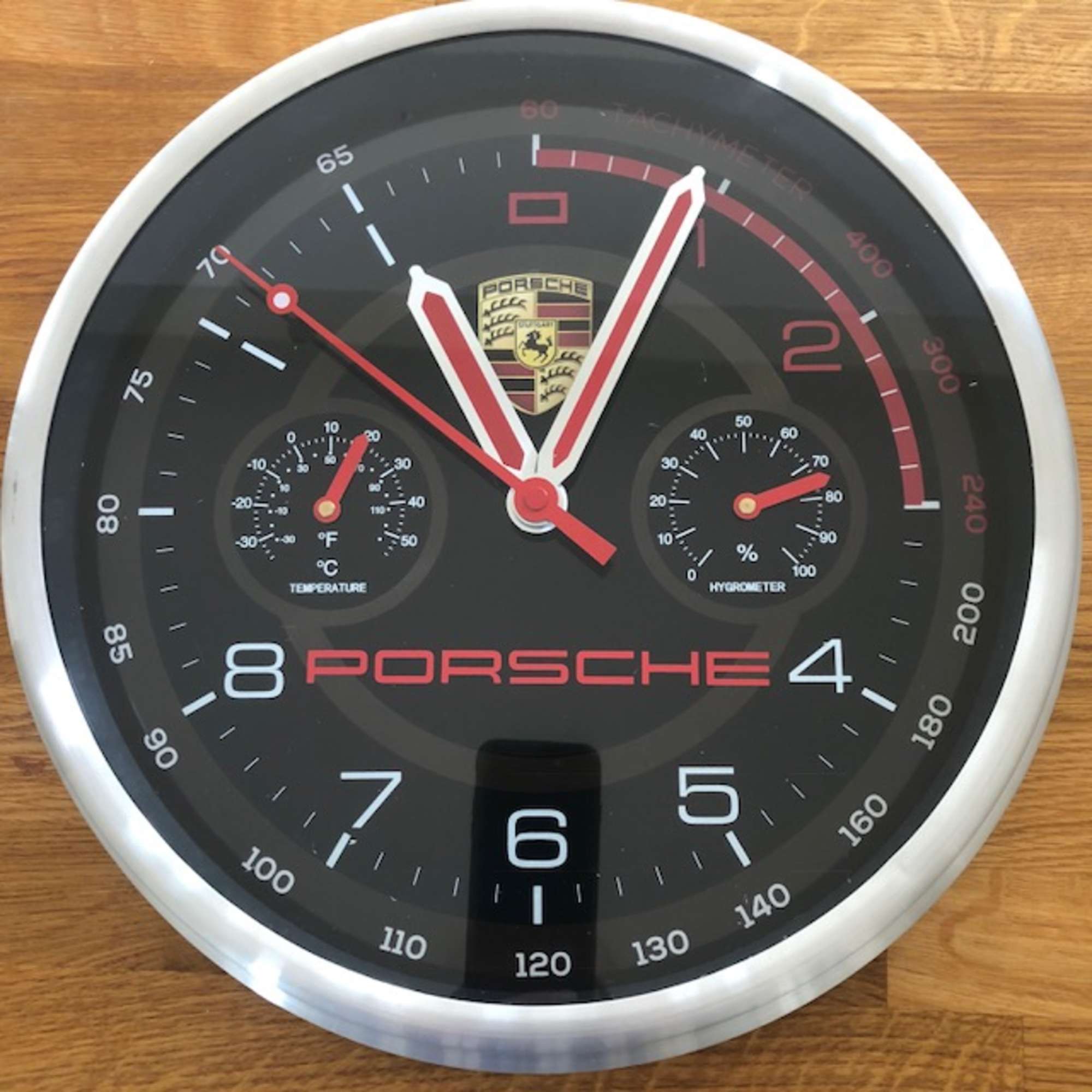 A Porsche wall clock with dashboard design -Sold